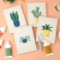 Serene Greens 4-piece punch needle DIY kit by HeyHobby, showing colorful punch needle tools and green yarns for embroidery crafts.