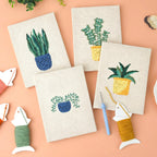 Serene Greens 4-piece punch needle DIY kit by HeyHobby, showing colorful punch needle tools and green yarns for embroidery crafts.