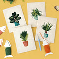 HeyHobby Tranquil Plants punch needle DIY kit with four colorful plant designs on fabric, perfect for crafting and home decor.