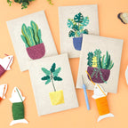 HeyHobby Tranquil Greens punch needle DIY kit with colorful embroidery floss, punch needle, and fabric for crafting projects.