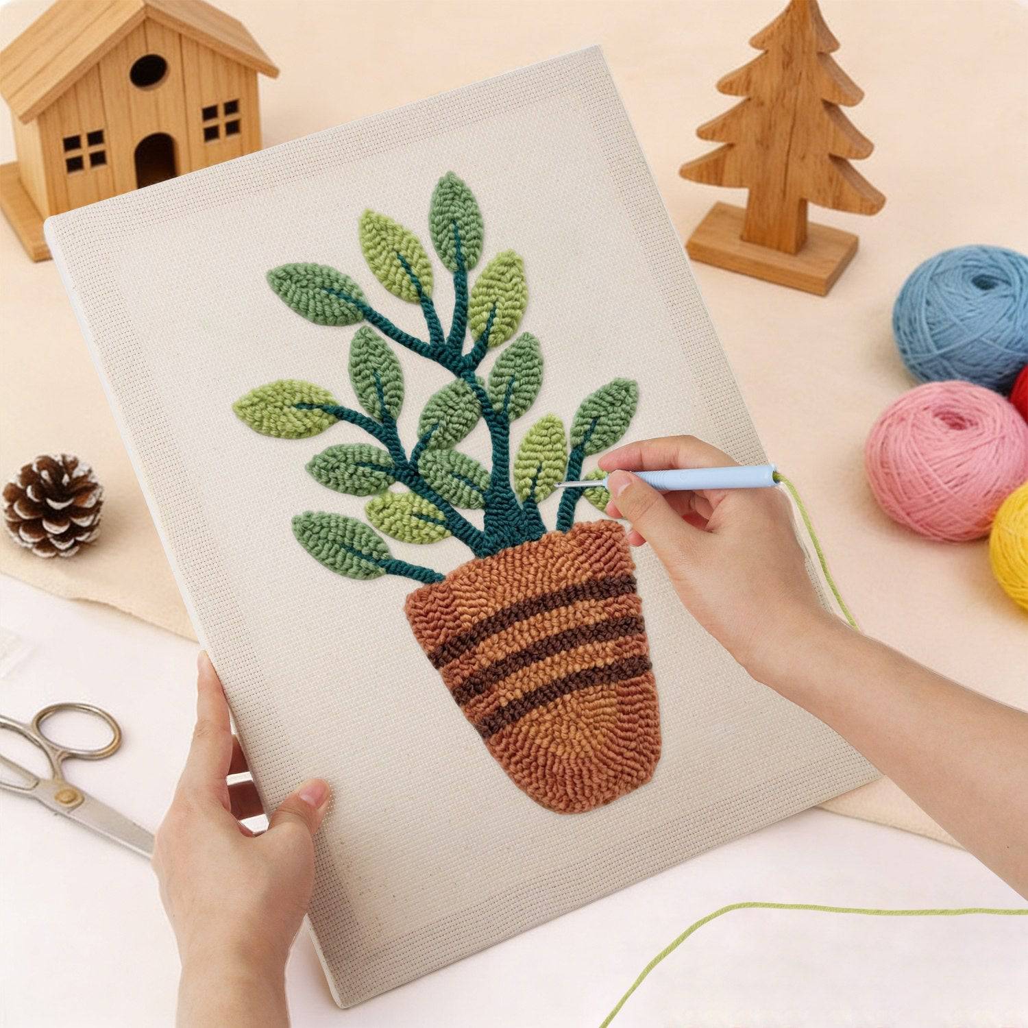 HeyHobby Serene Leaf Punch Needle DIY Kit with colorful threads and needle for creating leaf-themed embroidery art.