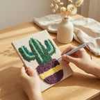 HeyHobby Botanical Bliss 4-piece punch needle set DIY kit with colorful embroidery tools and fabric for crafting projects.