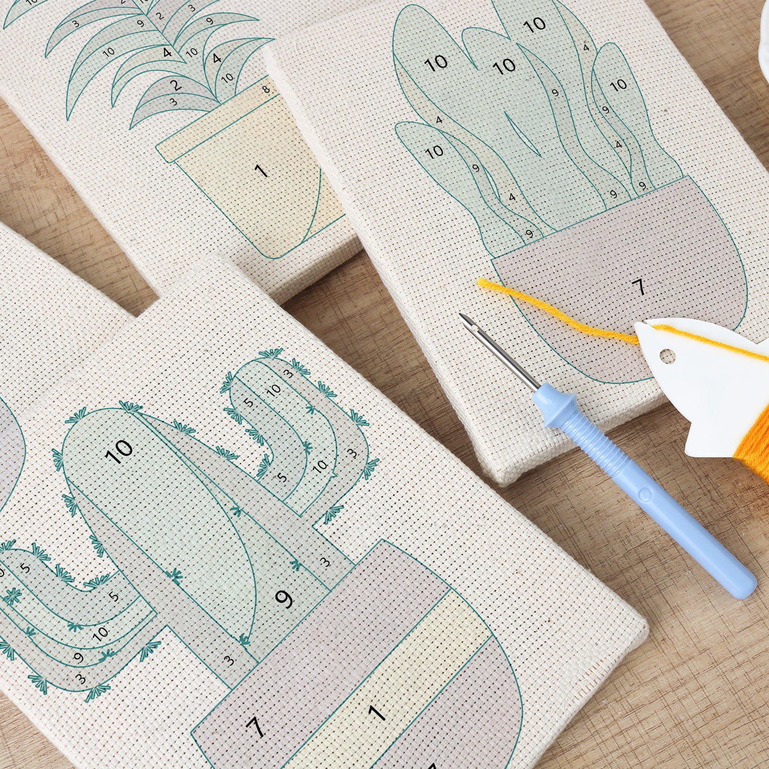 HeyHobby Botanical Bliss 4-Piece Punch Needle Set DIY kit with colorful embroidery tools and fabric for crafting.