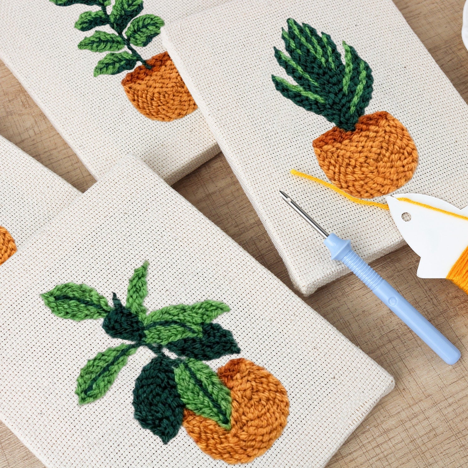 Earthy Greens 4-piece punch needle DIY kit by HeyHobby, featuring colorful punch needle tools and vibrant craft materials.