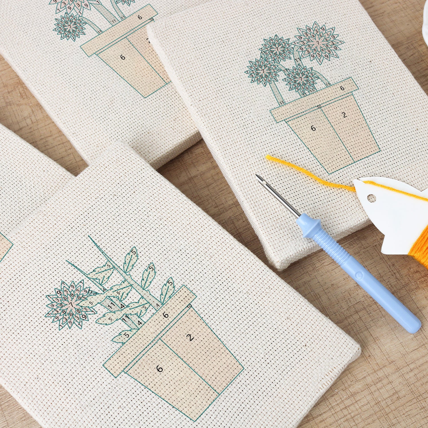 HeyHobby Floral Serenity 4-Piece Punch Needle Set DIY kit with colorful floral designs and tools for embroidery projects.
