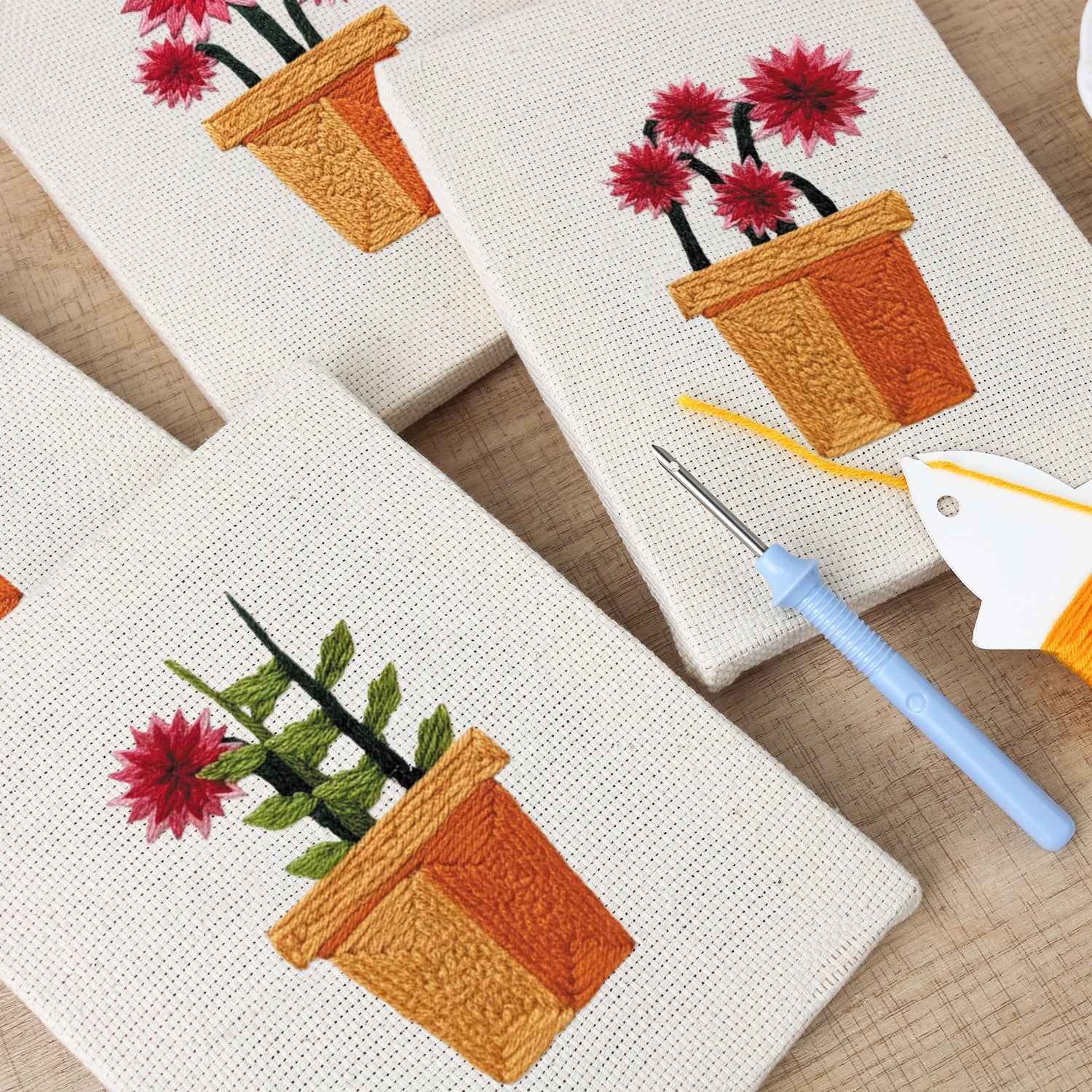 HeyHobby Floral Serenity 4-Piece Punch Needle DIY Kit with colorful floral designs and tools for hand embroidery crafts.