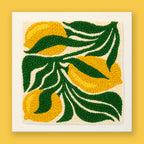 HeyHobby Lemon Grove Punch Needle Kit for DIY embroidery, featuring colorful fabric and punch needle tools.