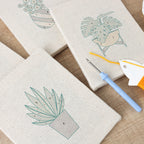 HeyHobby Plant Harmony 4-Piece Punch Needle Set DIY kit with colorful punch needles and accessories for creating textured plant-themed embroidery.