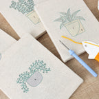 Serene Greens 4-piece punch needle DIY kit by HeyHobby with colorful embroidery tools and materials for needlework projects.