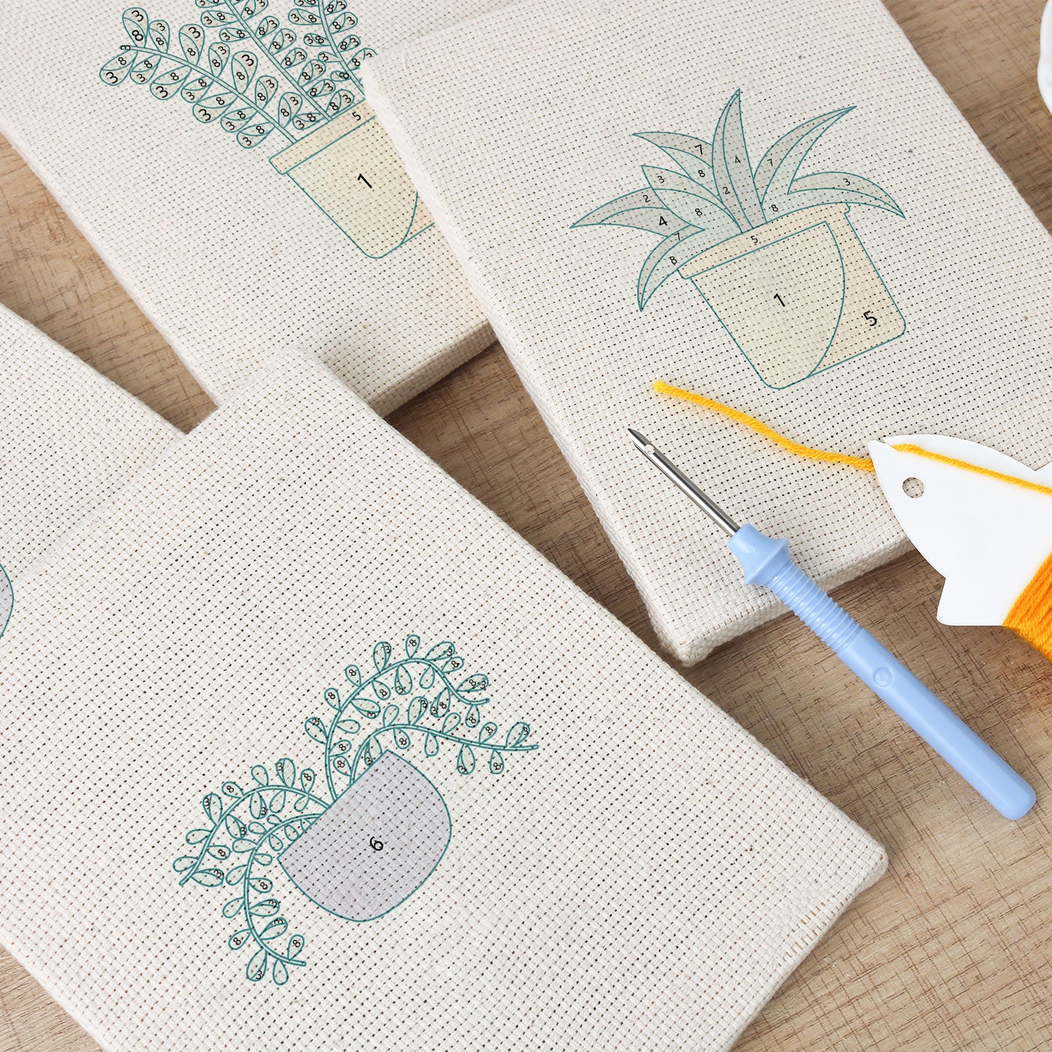 Serene Greens 4-piece punch needle DIY kit by HeyHobby with colorful embroidery tools and materials for needlework projects.