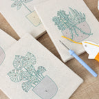 HeyHobby Tranquil Greens 4-Piece Punch Needle Set DIY kit with vibrant green and neutral shades for creative embroidery projects.