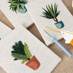 HeyHobby Tranquil Plants 4-Piece Punch Needle Set DIY kit with colorful plant designs and punch needle tools for crafting art projects.