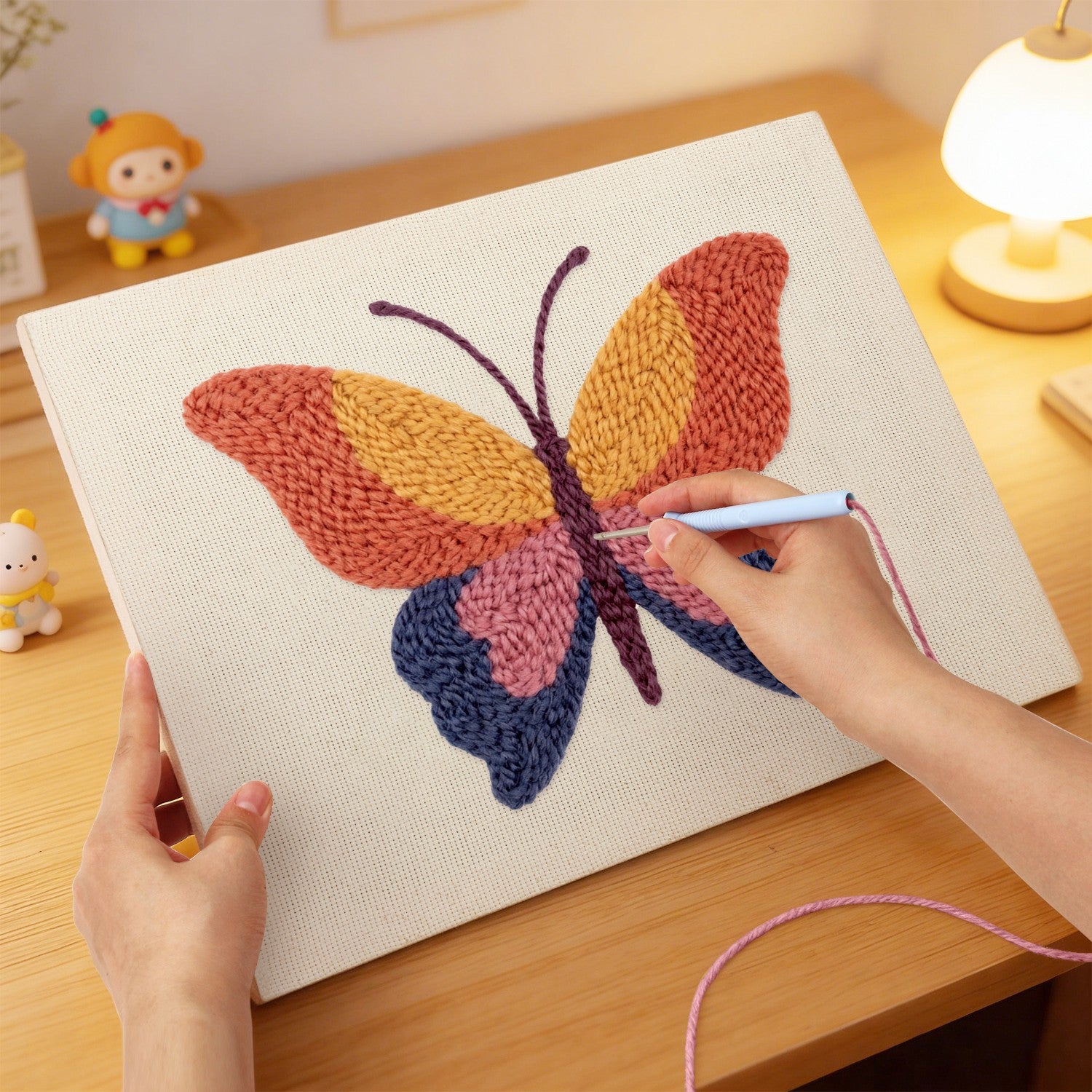 HeyHobby Butterfly Whimsy Punch Needle Kit DIY craft kit featuring colorful butterfly design on fabric, ready for embroidery.