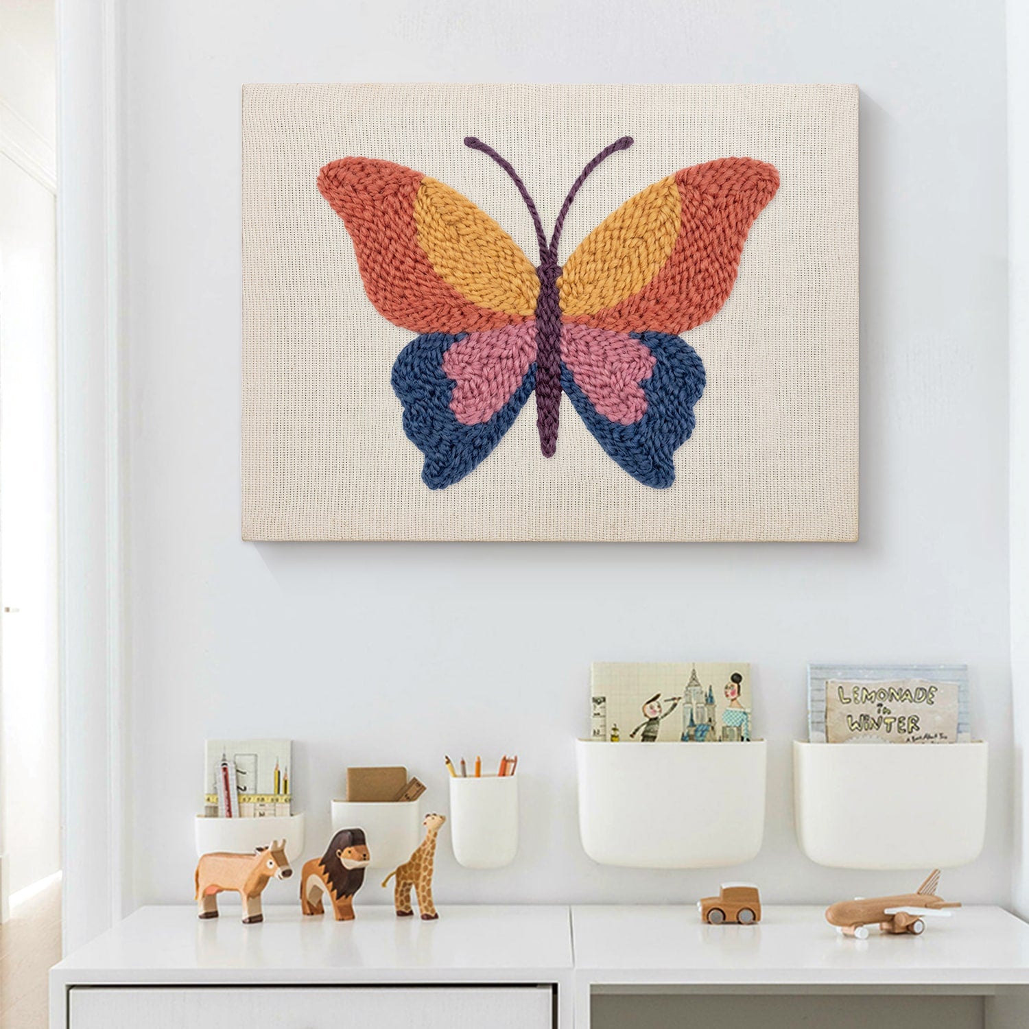 HeyHobby Butterfly Whimsy Punch Needle Kit for DIY embroidery, showing colorful butterfly design and punch needle tools.