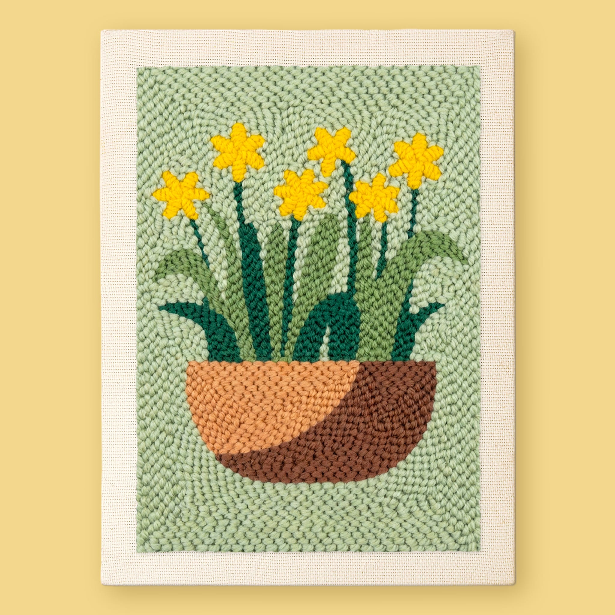 Spring Daffodils Punch Needle Kit by HeyHobby, DIY craft kit with colorful daffodil embroidery and punch needle tools.