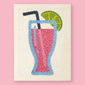 Tropical Sip Punch Needle Kit by HeyHobby featuring colorful fabric, punch needle tools, and tropical-themed embroidery design.