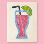 Tropical Sip Punch Needle Kit by HeyHobby featuring colorful fabric, punch needle tools, and tropical-themed embroidery design.