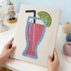 HeyHobby Tropical Sip Punch Needle Kit for DIY embroidery, featuring colorful tropical-themed design on a small punch needle project.