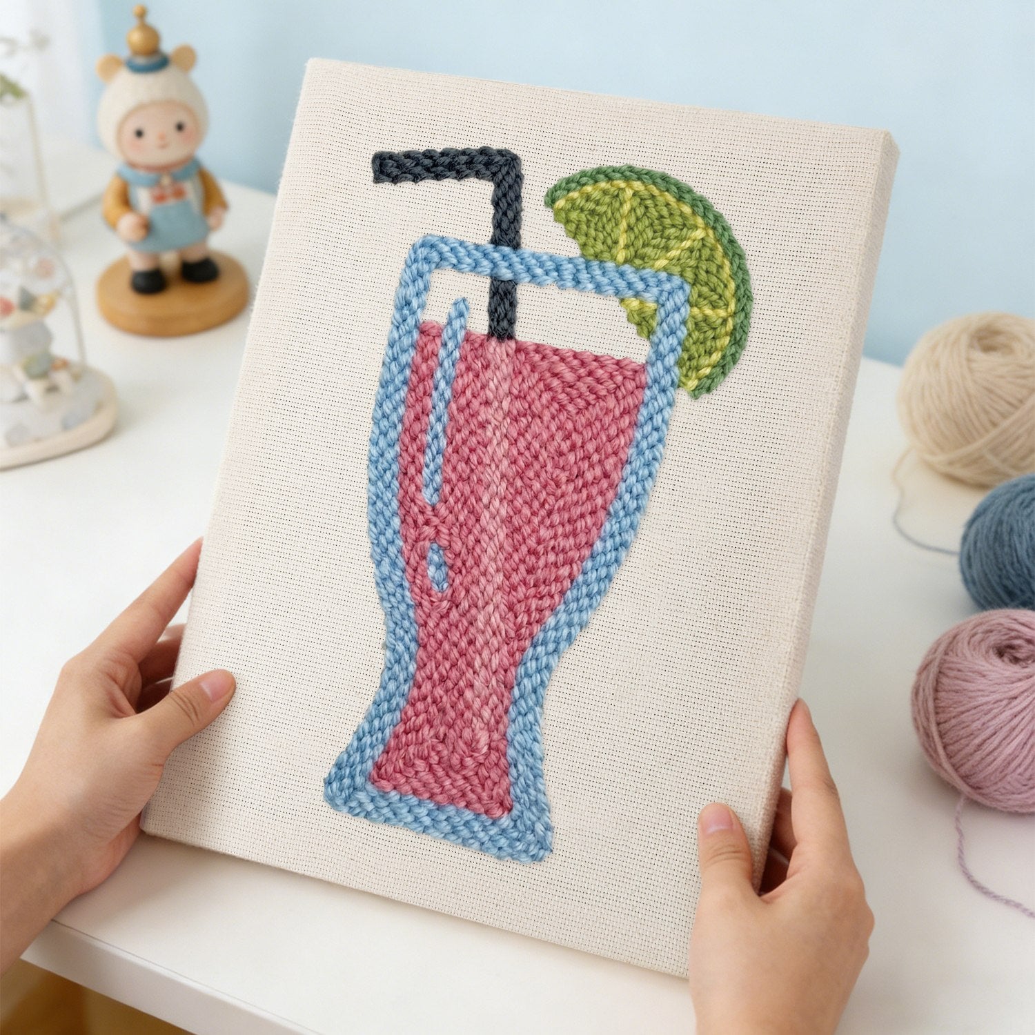 HeyHobby Tropical Sip Punch Needle Kit for DIY embroidery, featuring colorful tropical-themed design on a small punch needle project.