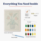 HeyHobby Tulip Delight Punch Needle Kit DIY kit with colorful embroidery supplies and fabric for creating floral wall art.